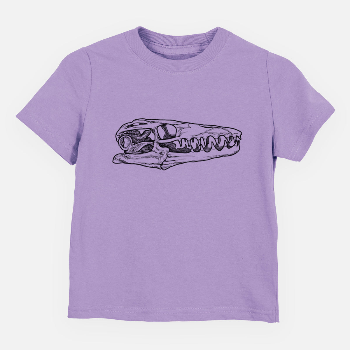 Lavender toddler t-shirt laid flat, printed with a detailed black ink illustration of a Mosasaur skull.