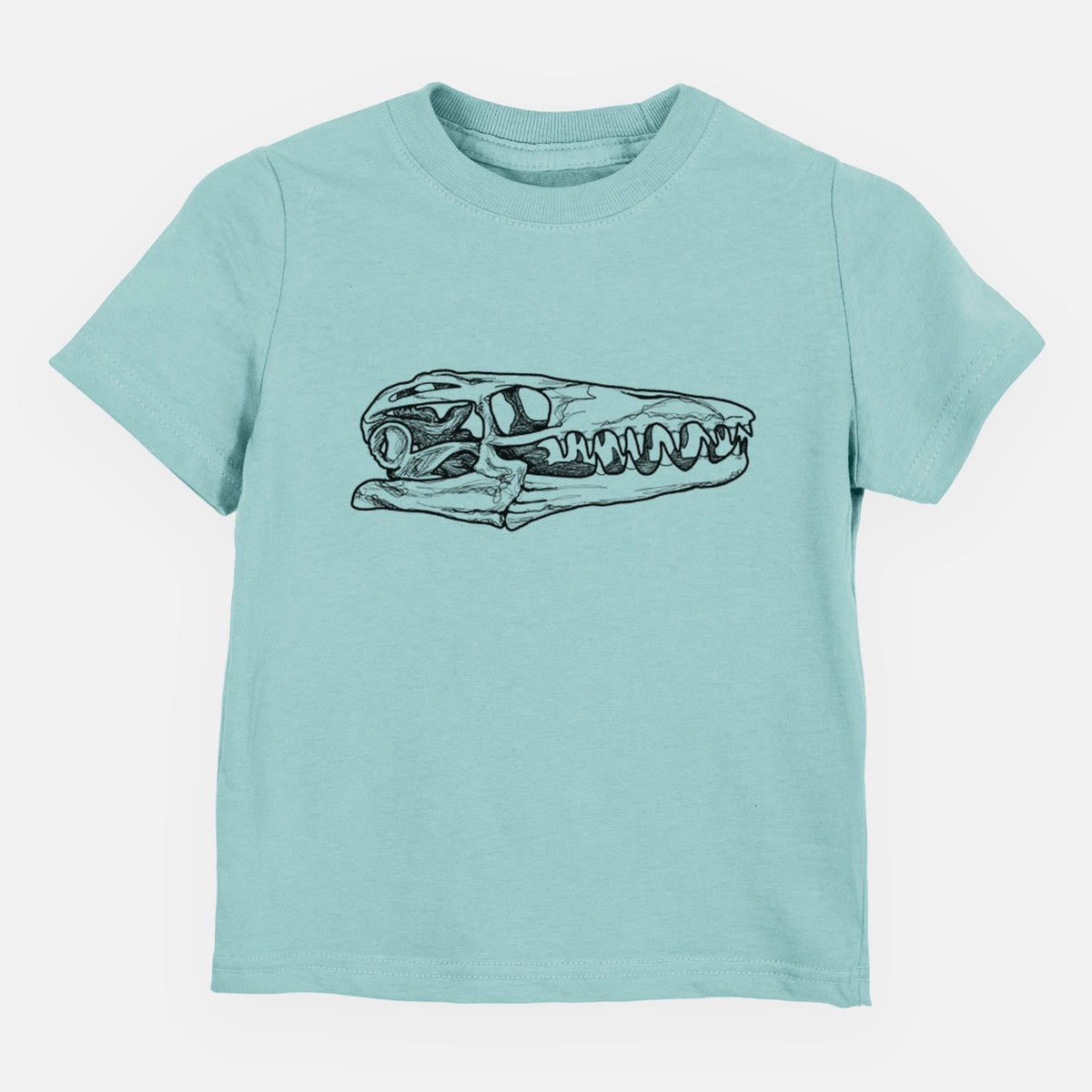 Saltwater toddler t-shirt laid flat, printed with a detailed black ink illustration of a Mosasaur skull.