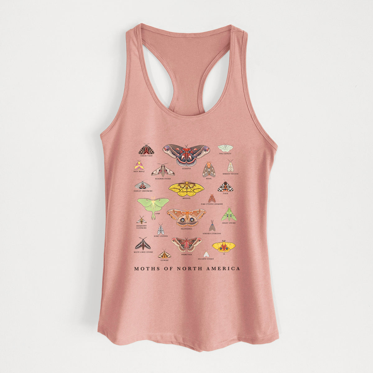 Desert pink women's racerback tank top laid flat, printed with a full-color chart of North American moths, each labeled with its species.