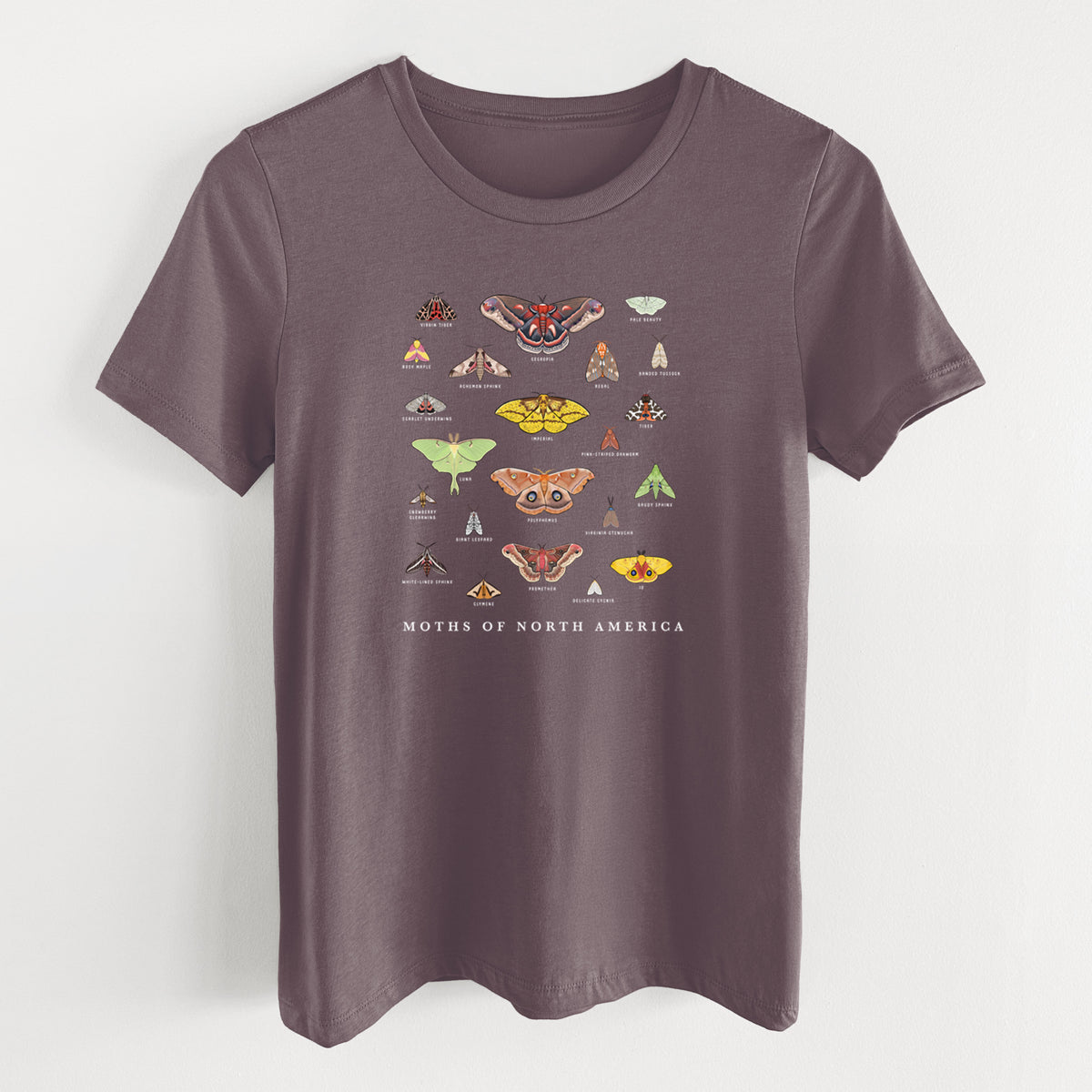 Purple storm women's relaxed fit cotton t-shirt laid flat, printed with a full-color chart of North American moths, each labeled with its species.