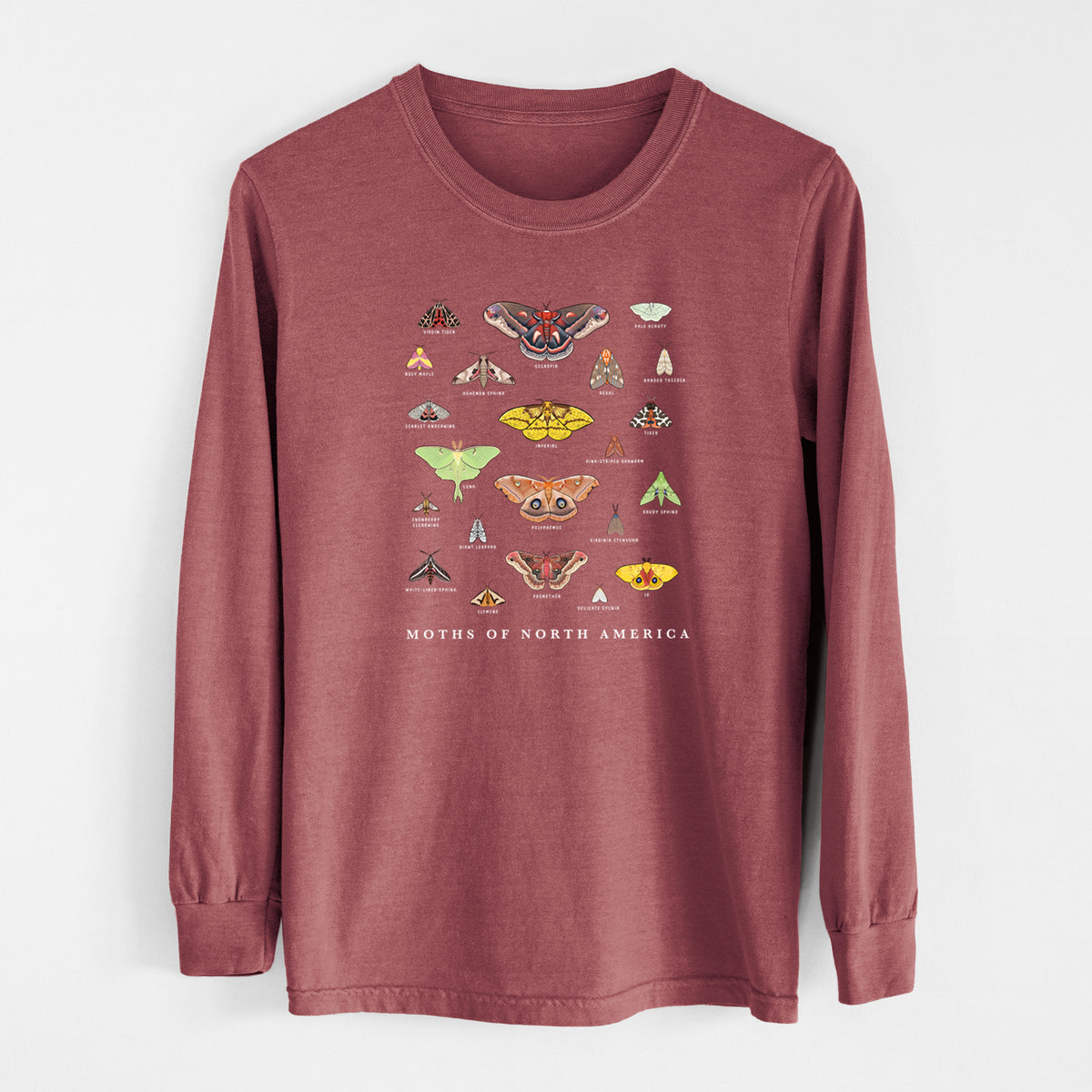 Brick red Comfort Colors long sleeve shirt laid flat, printed with a full-color chart of North American moths, each labeled with its species.
