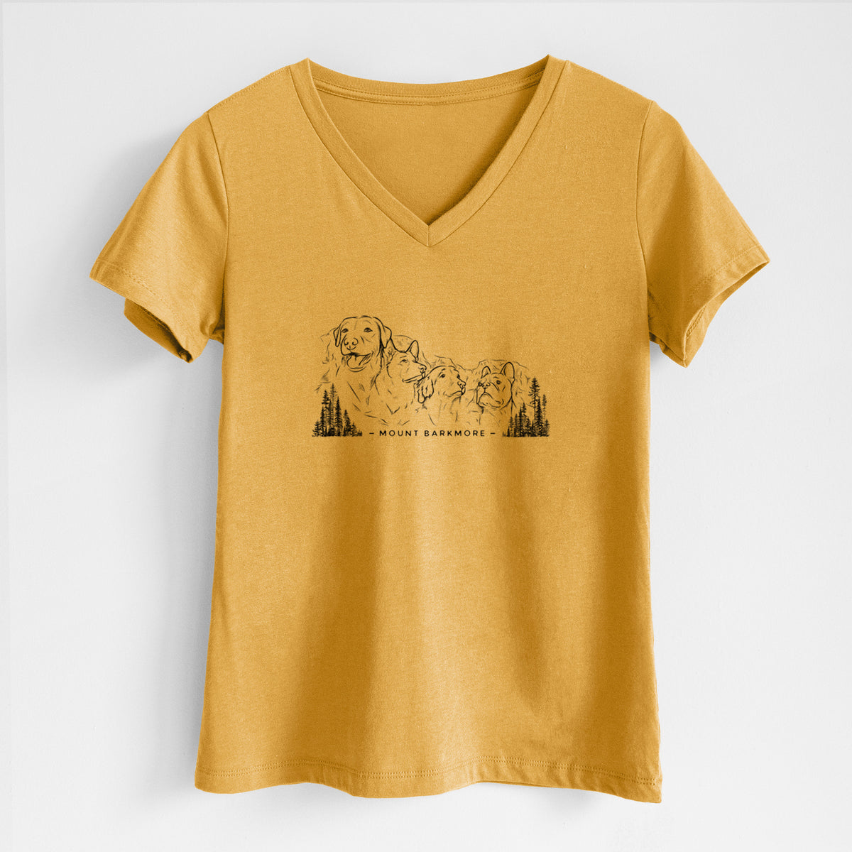 Honeycomb yellow women's relaxed fit cotton V-neck t-shirt laid flat, printed with a black ink illustration of four dog faces carved into a mountain, with the words Mount Barkmore.