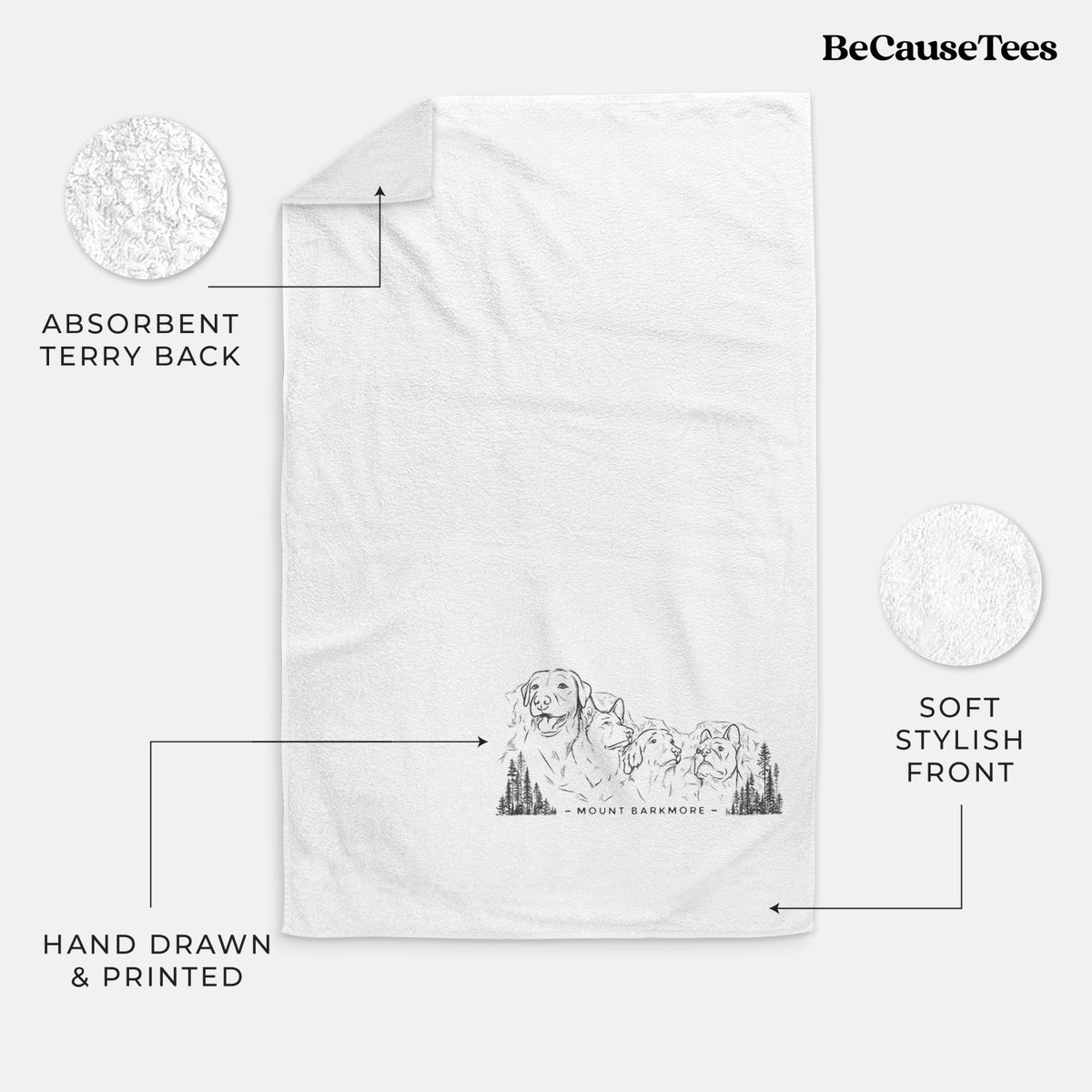 White hand towel printed with a black ink illustration of four dog faces carved into a mountain, with the words Mount Barkmore.