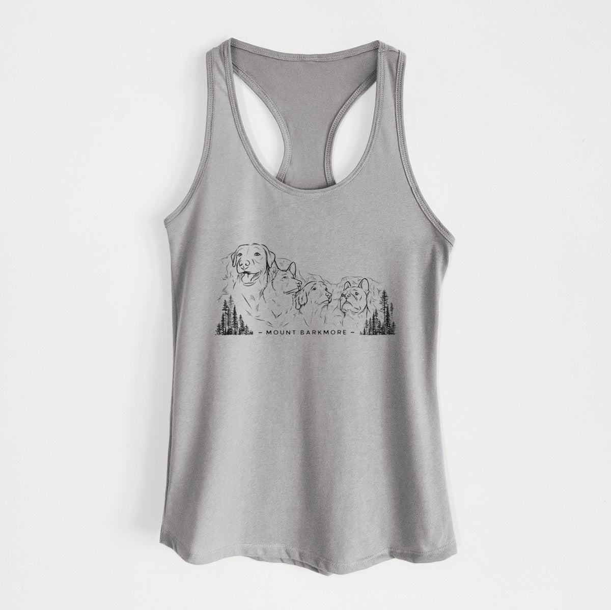 Heather grey women's racerback tank top laid flat, printed with a black ink illustration of four dog faces carved into a mountain, with the words Mount Barkmore.
