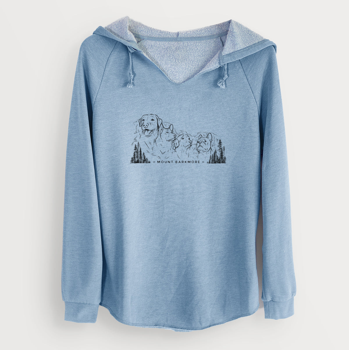 Misty blue women's Cali Wave hooded sweatshirt laid flat, printed with a black ink illustration of four dog faces carved into a mountain, with the words Mount Barkmore.