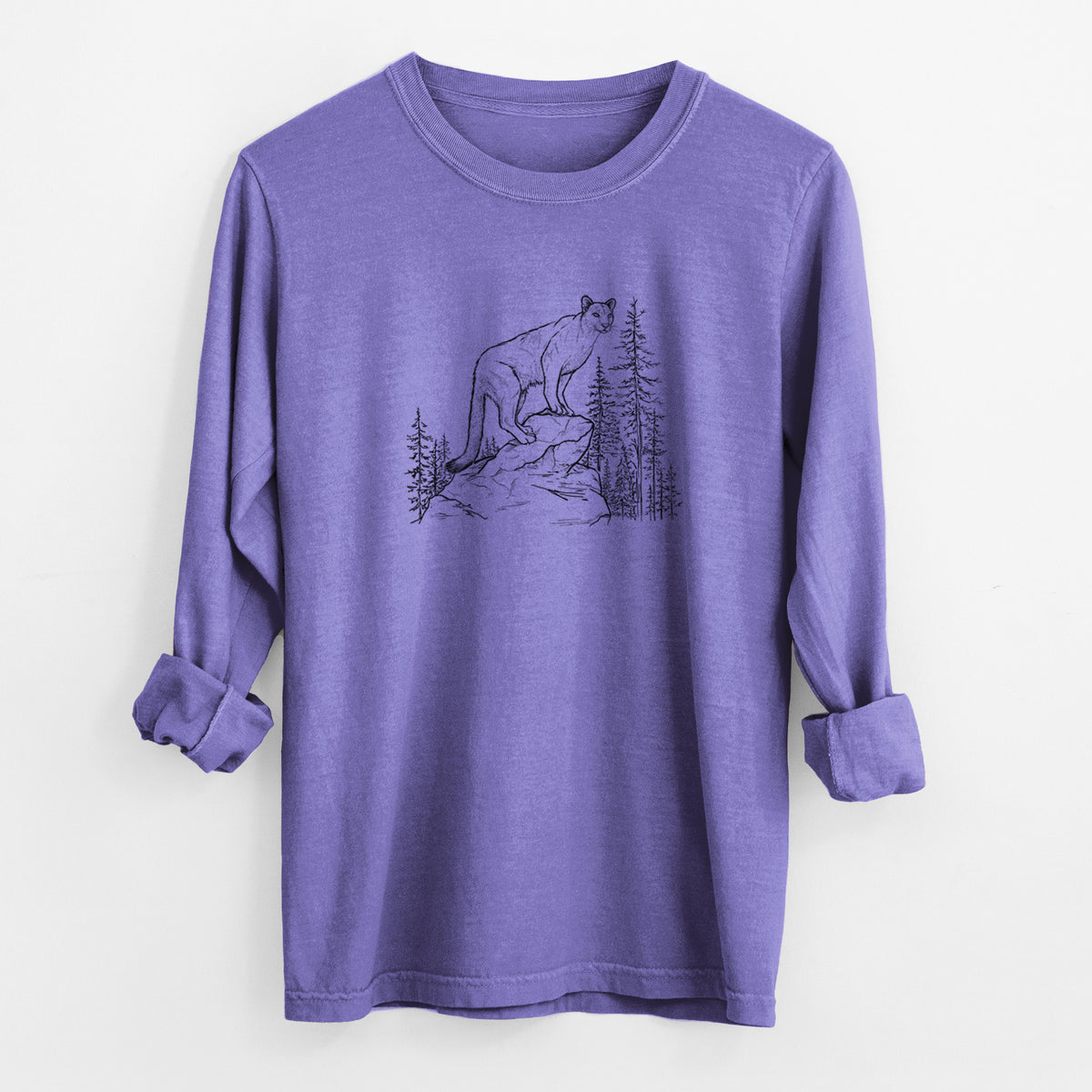 Violet purple Comfort Colors long sleeve shirt laid flat with the cuffs rolled, printed with a black ink illustration of a mountain lion standing on a rocky ledge among pine trees.