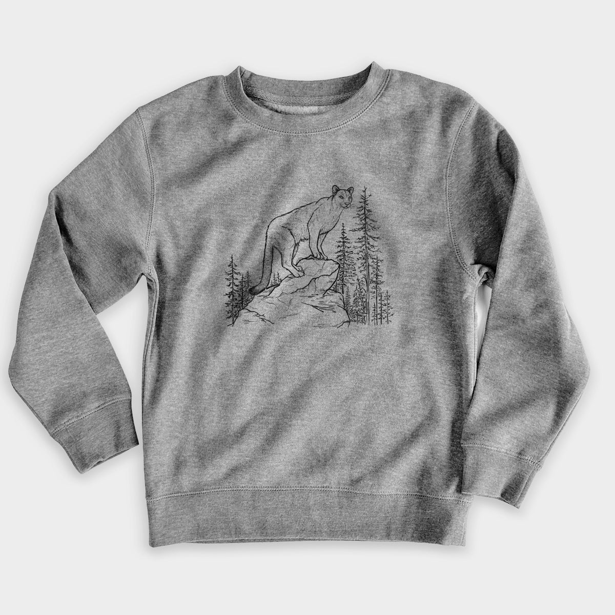 Nickel grey youth crewneck sweatshirt laid flat, printed with a black ink illustration of a mountain lion standing on a rocky ledge among pine trees.