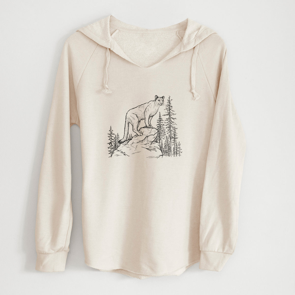 Bone cream women's Cali Wave hooded sweatshirt laid flat, printed with a black ink illustration of a mountain lion standing on a rocky ledge among pine trees.