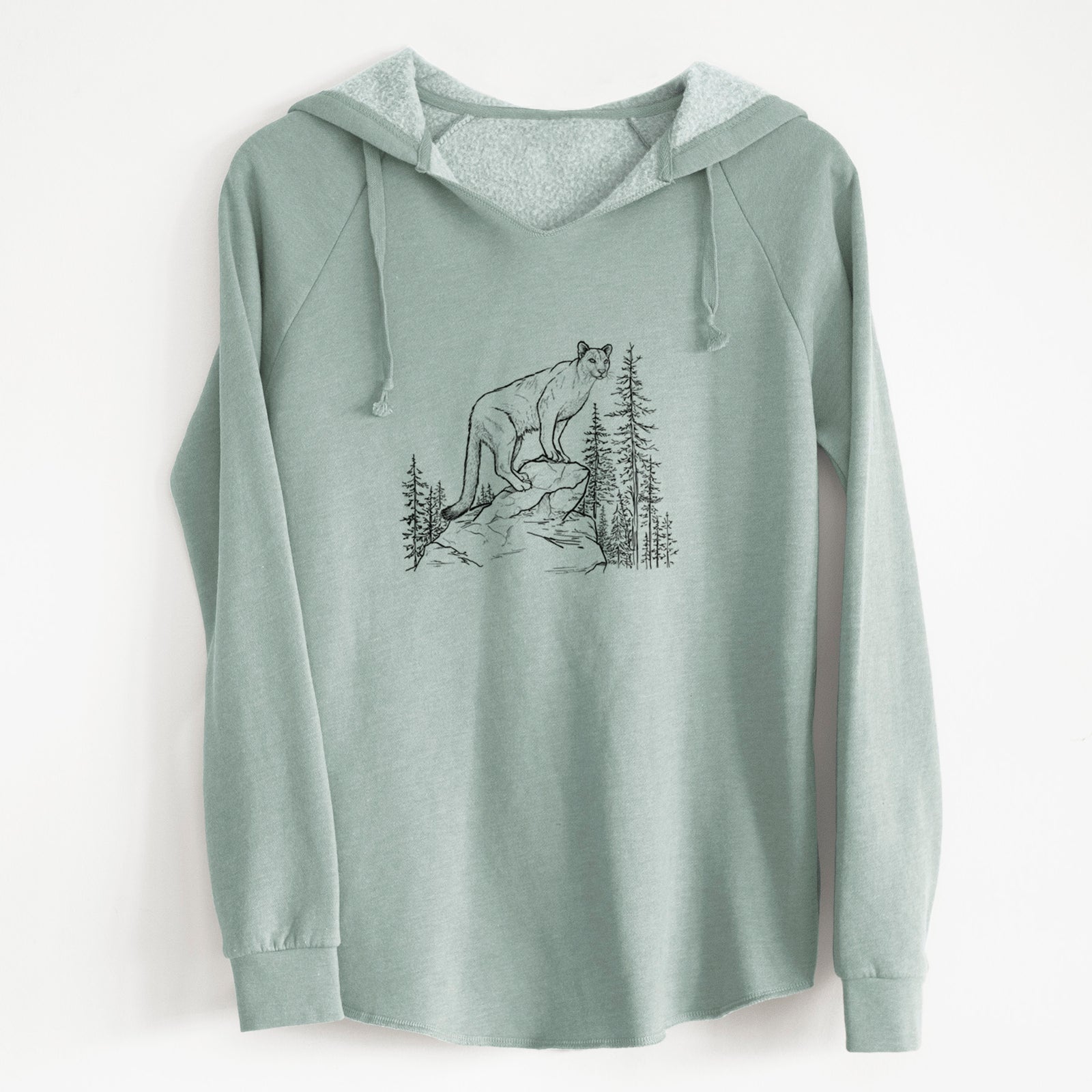 Sage green women's Cali Wave hooded sweatshirt laid flat, printed with a black ink illustration of a mountain lion standing on a rocky ledge among pine trees.
