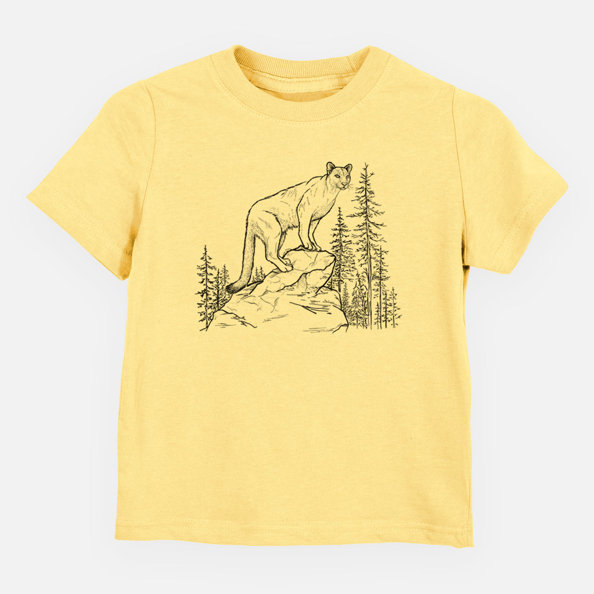 Butter yellow toddler t-shirt laid flat, printed with a black ink illustration of a mountain lion standing on a rocky ledge among pine trees.