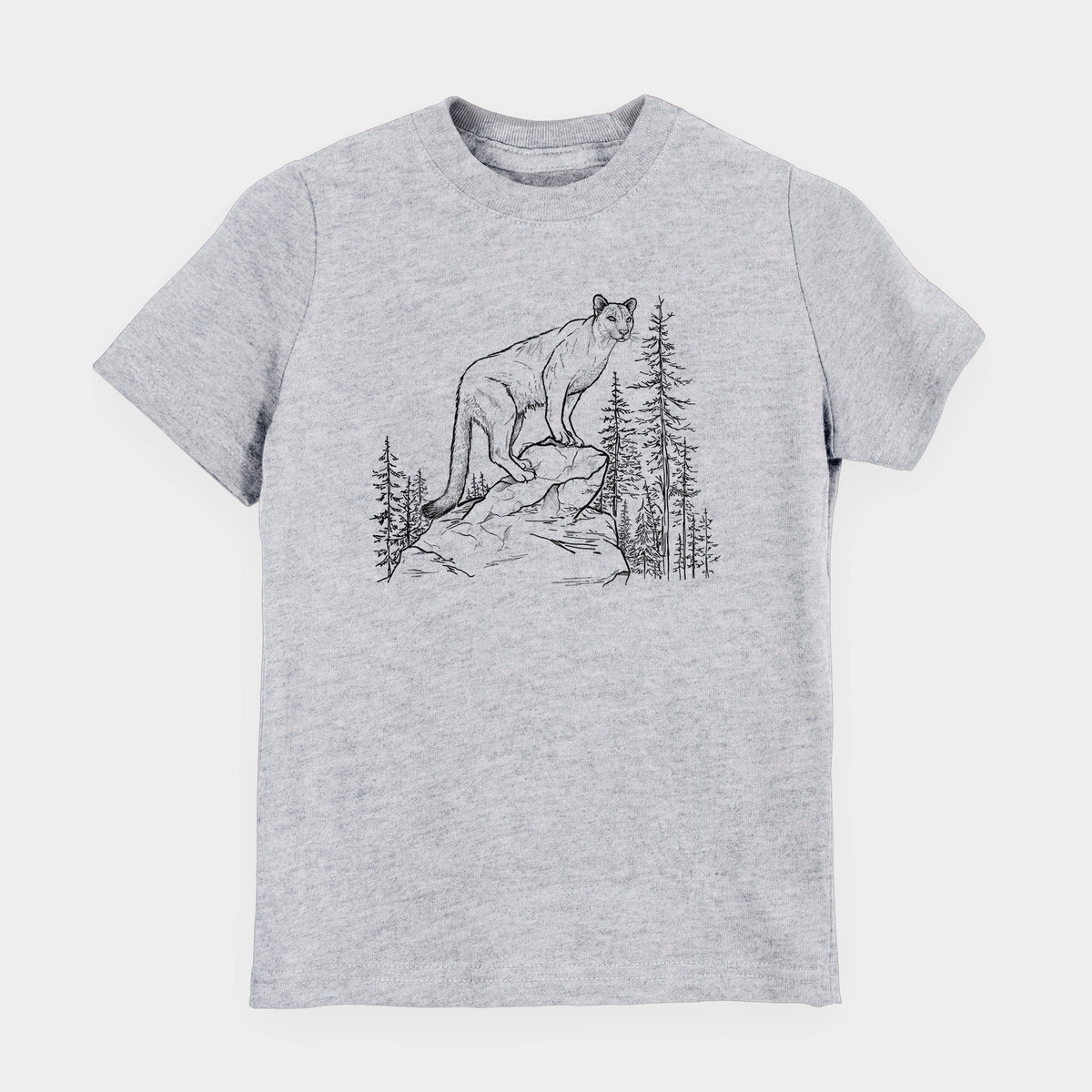 Heather grey youth t-shirt laid flat, printed with a black ink illustration of a mountain lion standing on a rocky ledge among pine trees.