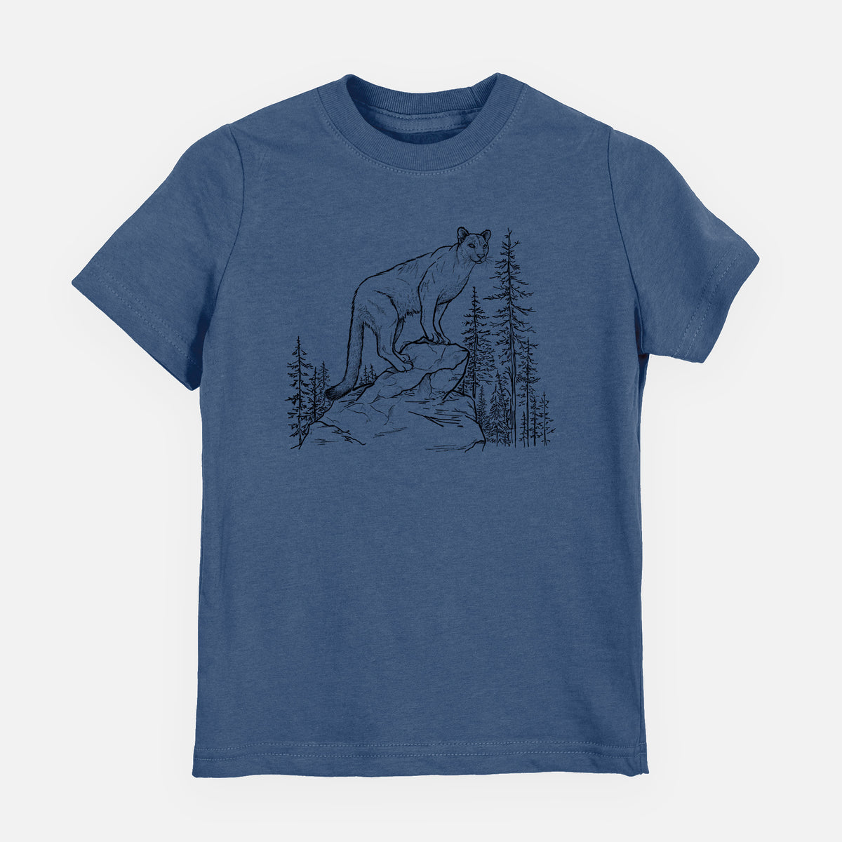 Indigo blue youth t-shirt laid flat, printed with a black ink illustration of a mountain lion standing on a rocky ledge among pine trees.