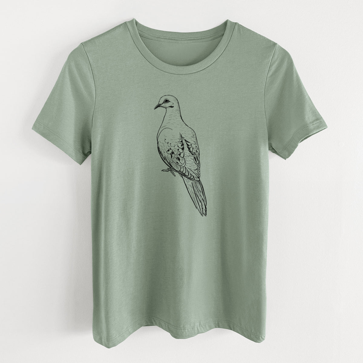 Sage green women's relaxed fit cotton t-shirt laid flat, printed with a detailed black ink sketch of a mourning dove perched.