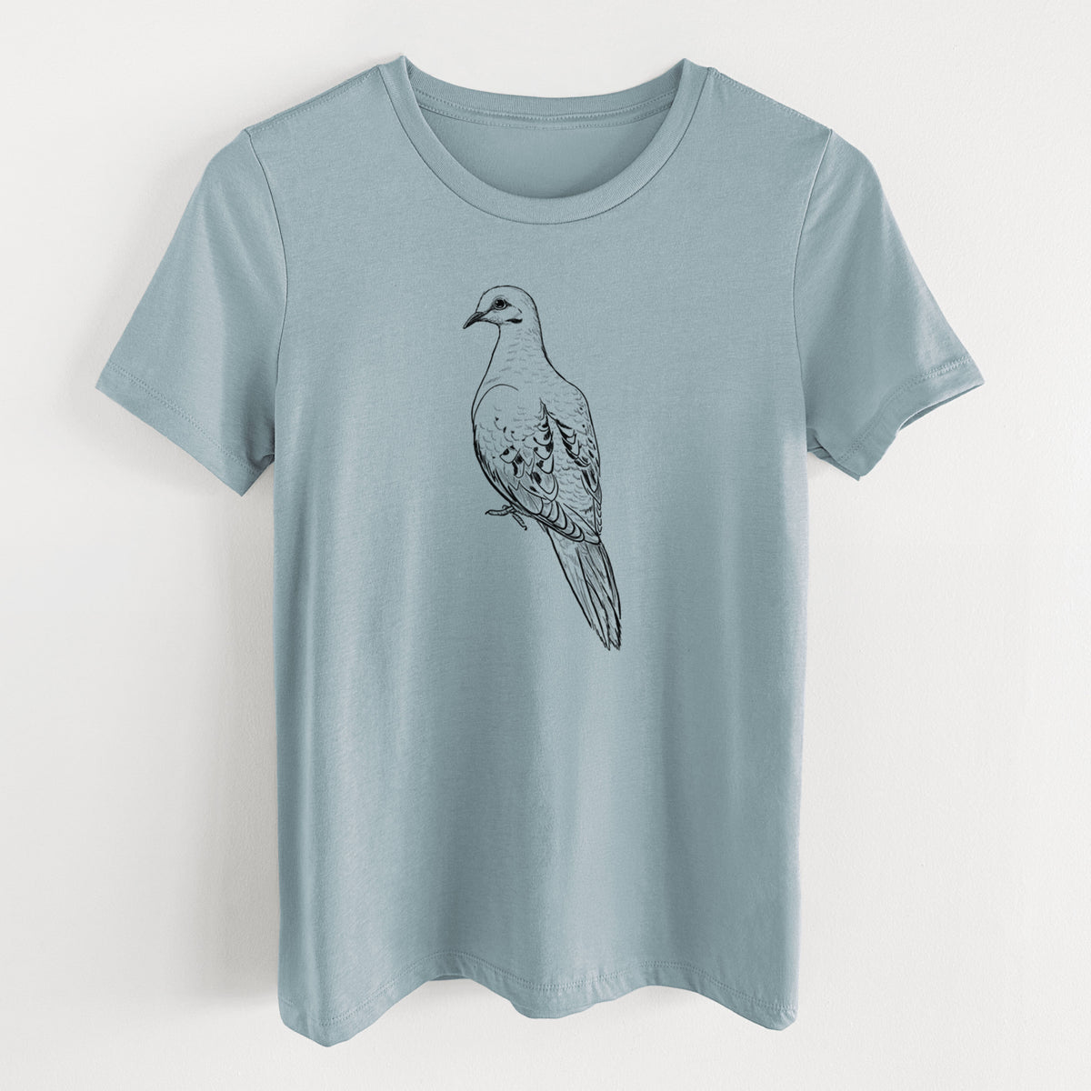 Vintage denim women's relaxed fit cotton t-shirt laid flat, printed with a detailed black ink sketch of a mourning dove perched.
