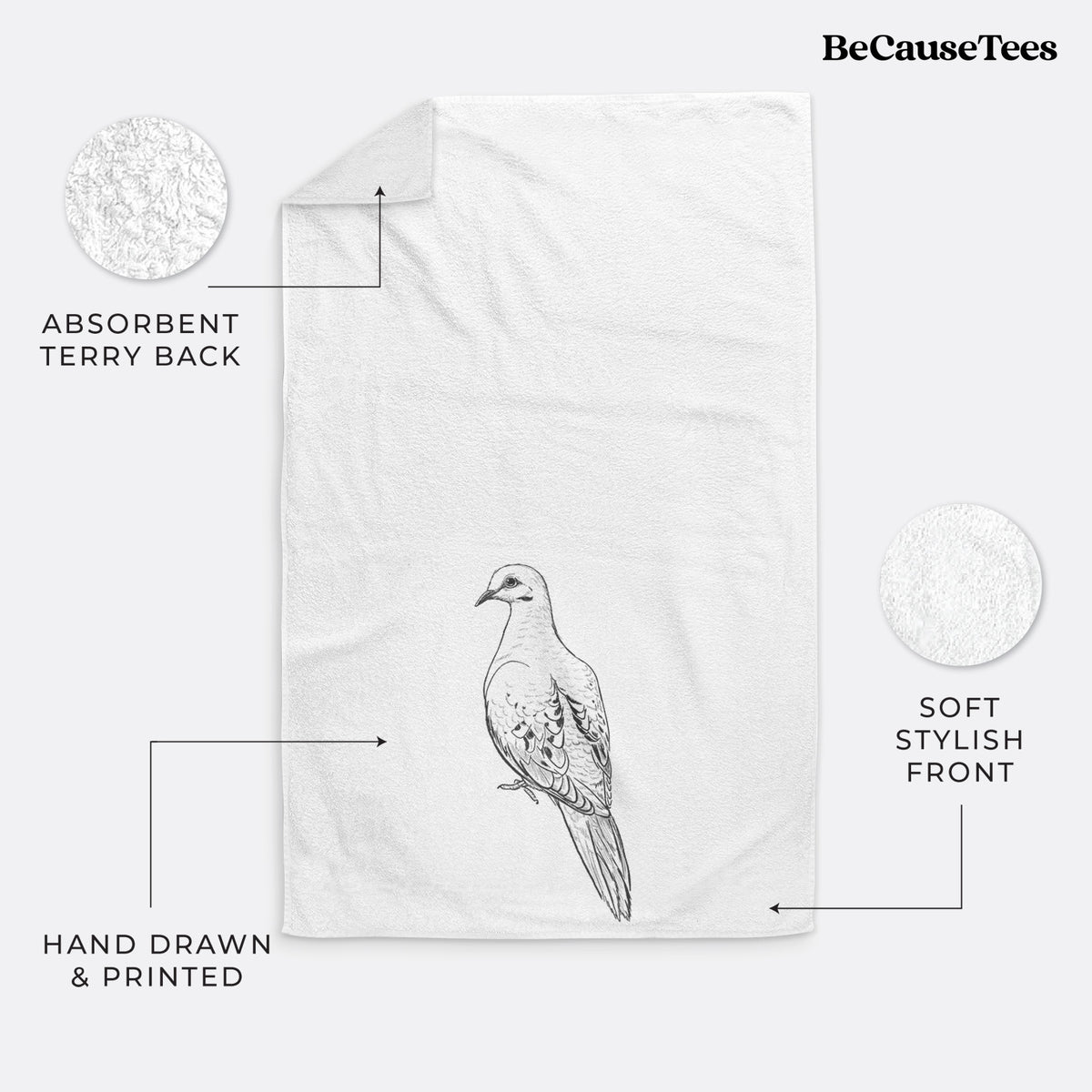 White hand towel printed with a detailed black ink sketch of a mourning dove perched.