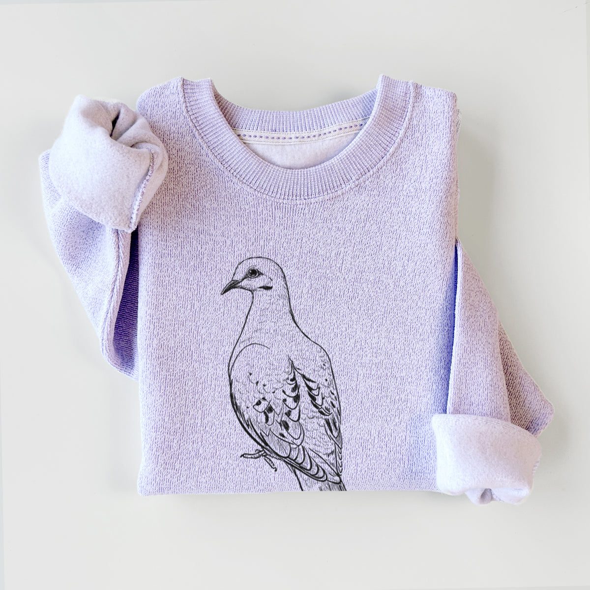 Ice purple knit sweatshirt printed with a detailed black ink sketch of a mourning dove perched, styled flat.