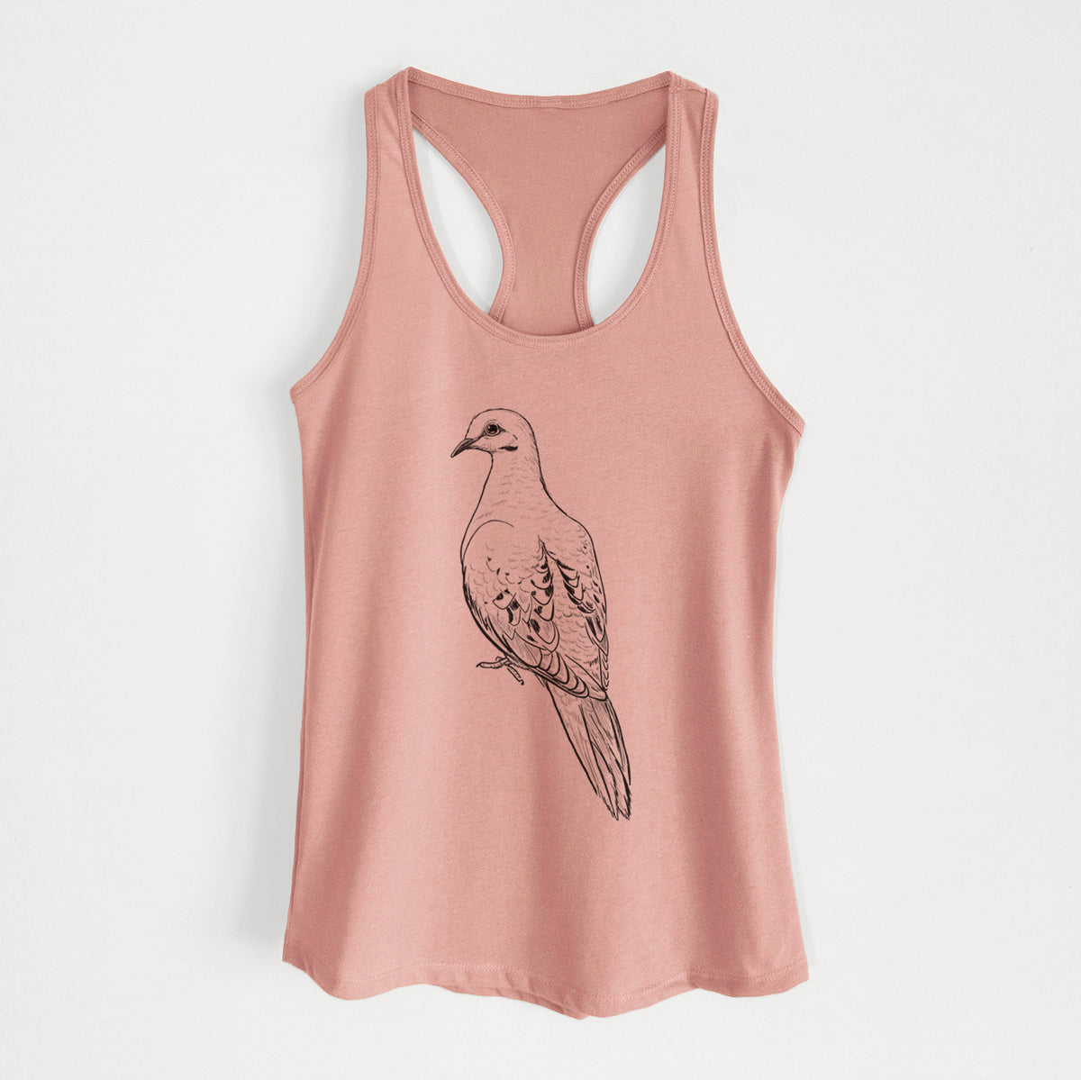 Desert pink women's racerback tank top laid flat, printed with a detailed black ink sketch of a mourning dove perched.