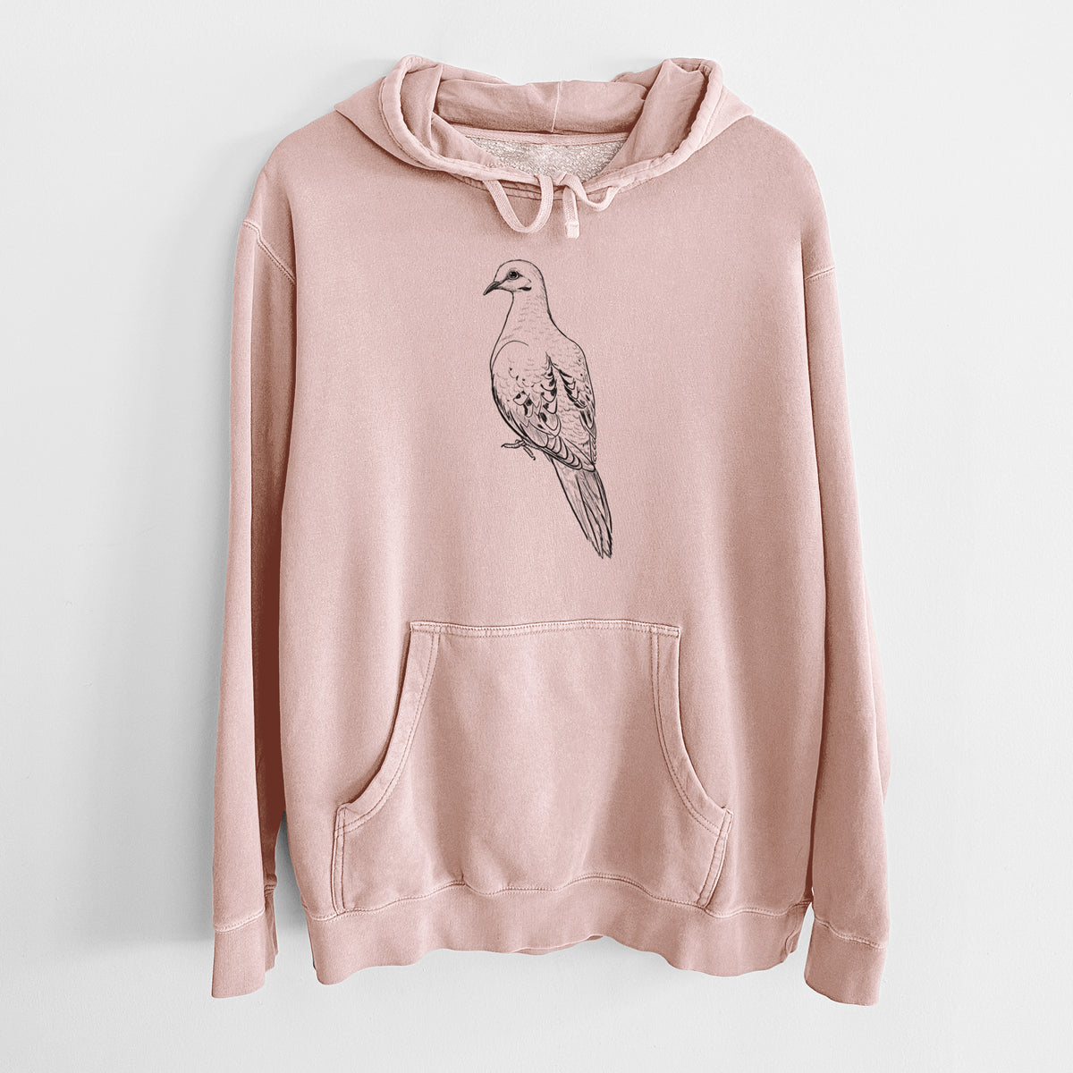 Dusty pink pigment dyed hoodie laid flat, printed with a detailed black ink sketch of a mourning dove perched.
