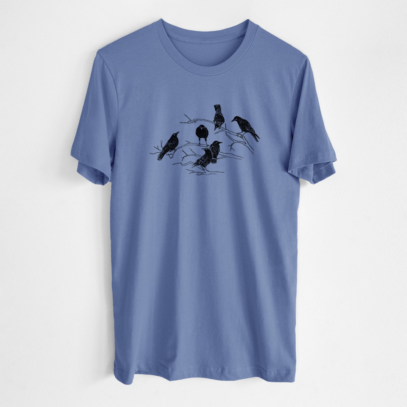 Blue bell lightweight cotton t-shirt laid flat, printed with a black ink illustration of a group of crows perched on bare branches.