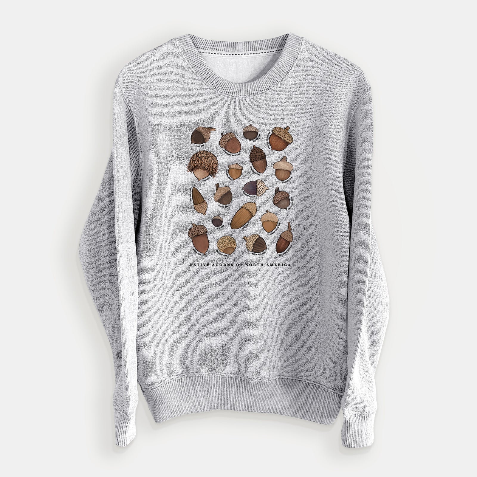 Salt and pepper knit sweatshirt laid flat, printed with a full-color chart of North American acorns, each labeled with its oak species.