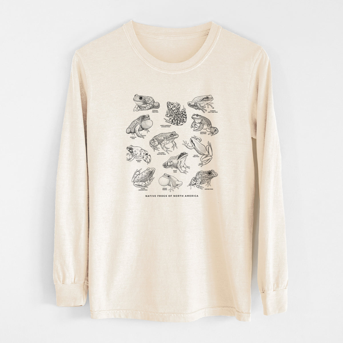 Ivory Comfort Colors long sleeve shirt laid flat, printed with a chart of black ink illustrations of North American frog species.