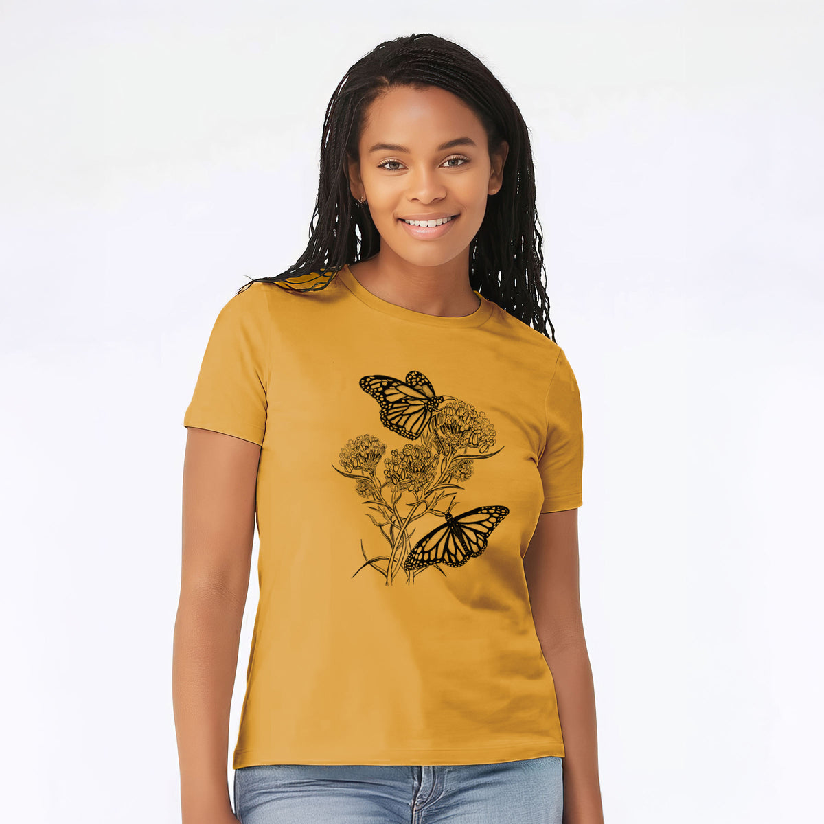 Woman wearing a mustard yellow women's relaxed fit cotton t-shirt printed with a black ink illustration of two monarch butterflies on flowering milkweed.