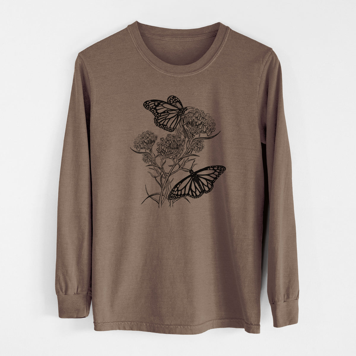 Espresso brown Comfort Colors long sleeve shirt laid flat, printed with a black ink illustration of two monarch butterflies on flowering milkweed.