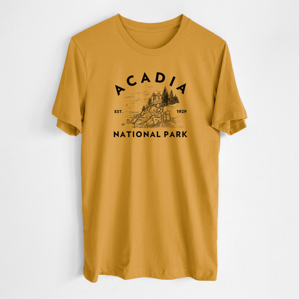 Honeycomb yellow lightweight cotton t-shirt laid flat, printed with a round badge of a rocky coastline and pine trees, with the words Acadia National Park, Est. 1929.