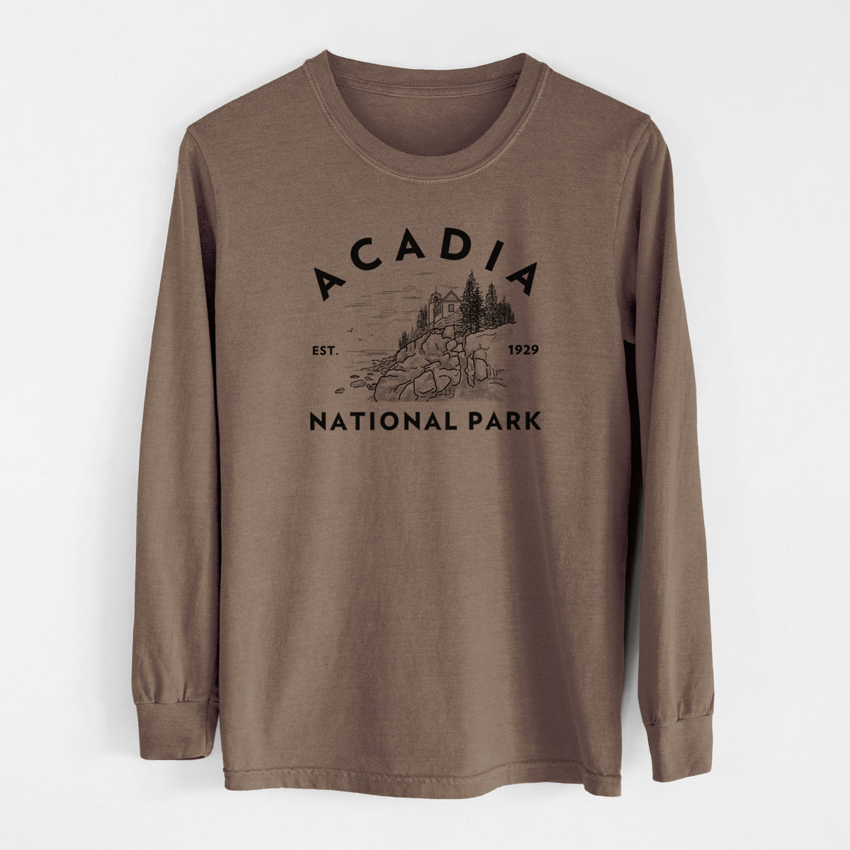 Espresso brown Comfort Colors long sleeve shirt laid flat, printed with a round badge of a rocky coastline and pine trees, with the words Acadia National Park, Est. 1929.