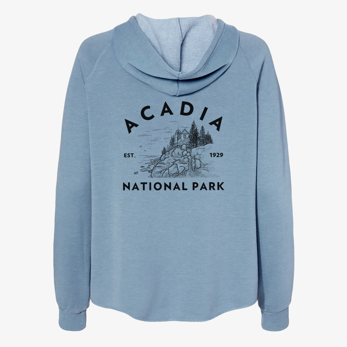 Misty blue women's Cali Wave zip-up sweatshirt laid flat, printed with a round badge of a rocky coastline and pine trees, with the words Acadia National Park, Est. 1929.