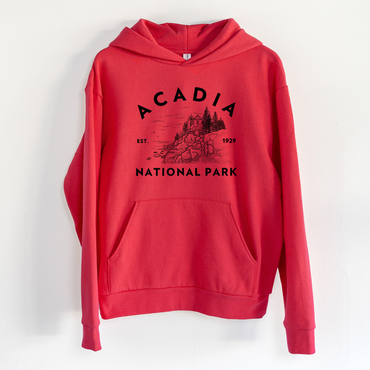 Acadia National Park - Statement Midweight Hoodie in Cherry Red, hanging on a white wall, with a front kangaroo pocket and no drawcords.
