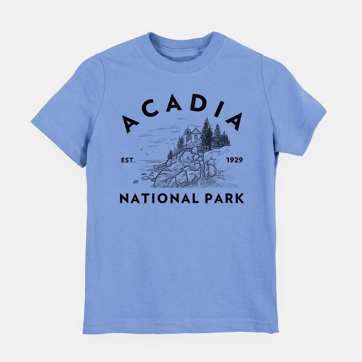Carolina blue youth t-shirt laid flat, printed with a round badge of a rocky coastline and pine trees, with the words Acadia National Park, Est. 1929.