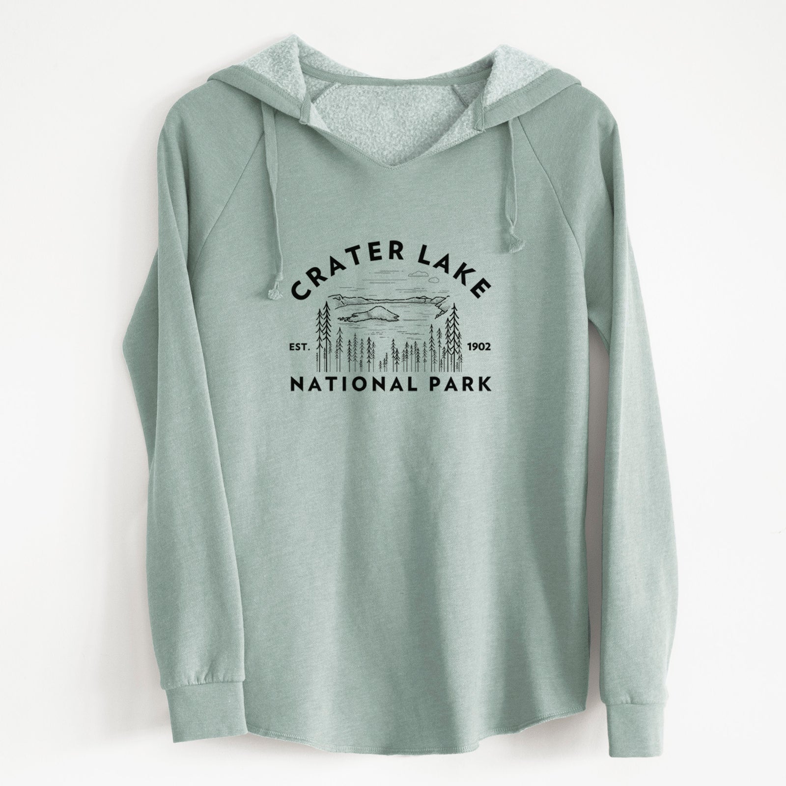 Sage green women's Cali Wave hooded sweatshirt laid flat, printed with a round badge of Crater Lake ringed by pine trees, with the words Crater Lake National Park, Est. 1902.