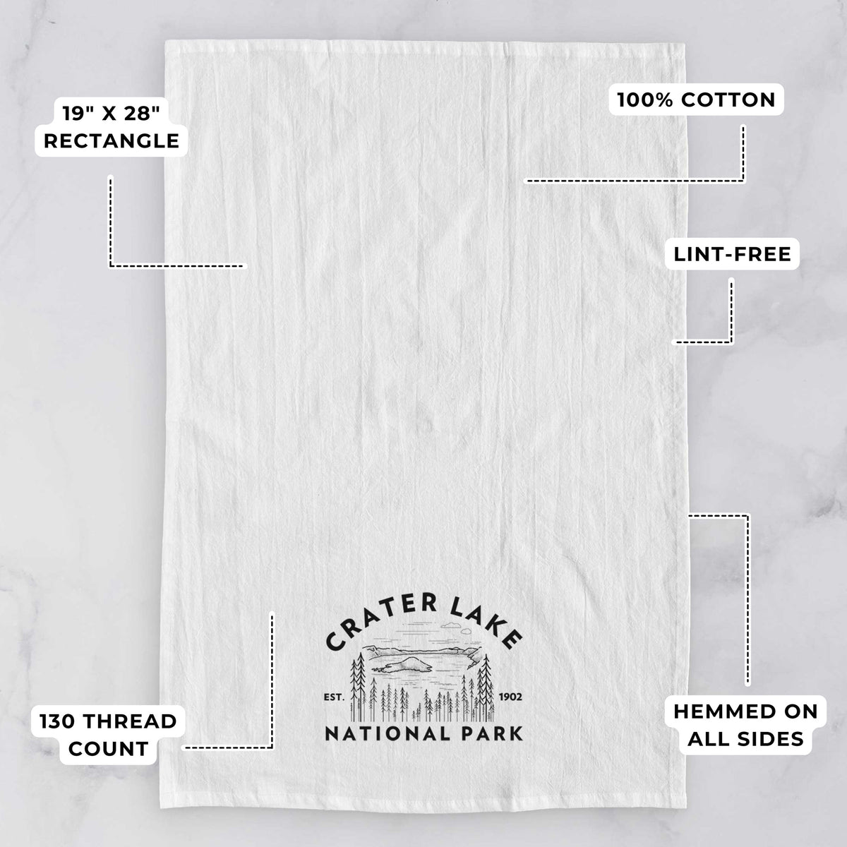 White tea towel printed with a round badge of Crater Lake ringed by pine trees, with the words Crater Lake National Park, Est. 1902, with feature labels: 19 by 28 inch rectangle, 100% cotton, lint-free, 130 thread count, hemmed on all sides.
