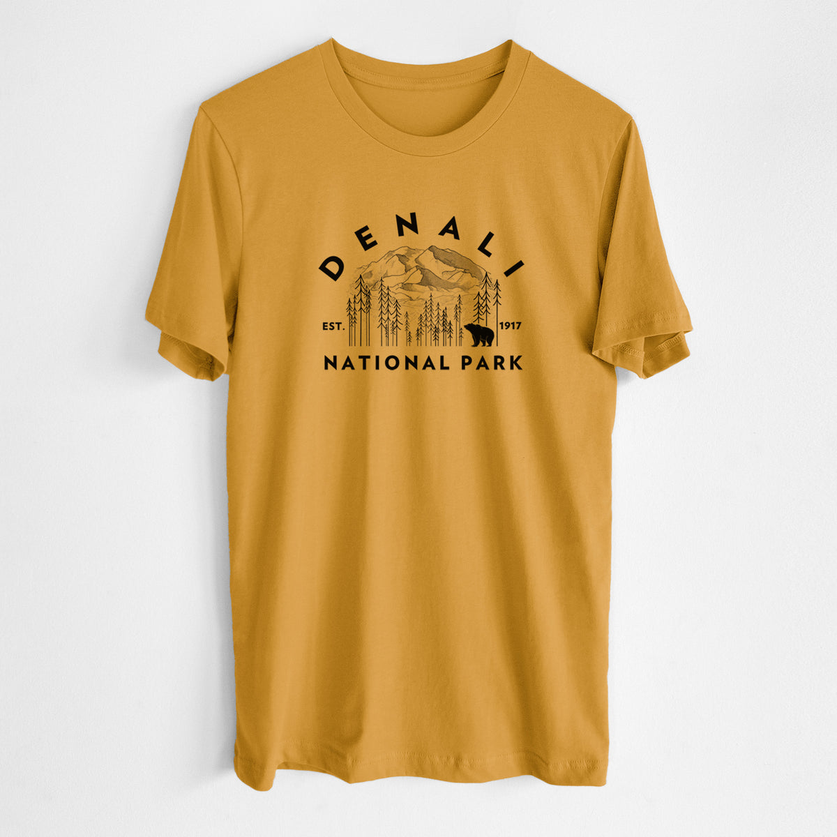 Honeycomb yellow lightweight cotton t-shirt laid flat, printed with a round badge of mountains, pine trees and a bear, with the words Denali National Park, Est. 1917.
