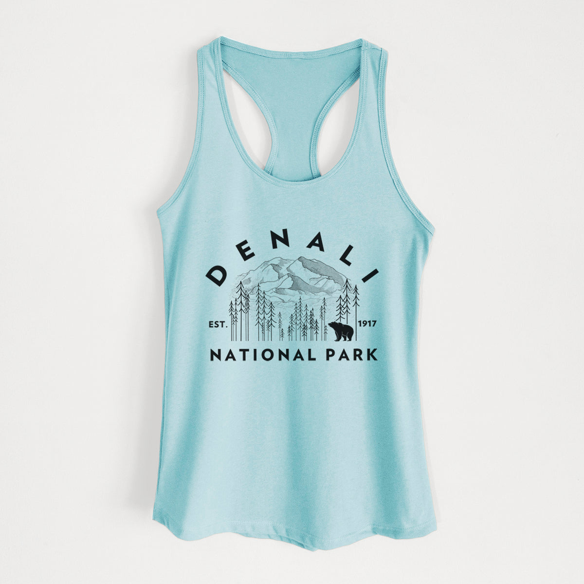 Cancun blue women's racerback tank top laid flat, printed with a round badge of mountains, pine trees and a bear, with the words Denali National Park, Est. 1917.