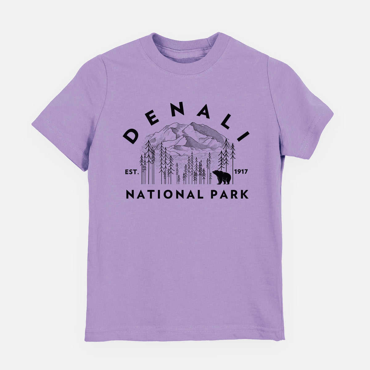 Lavender youth t-shirt laid flat, printed with a round badge of mountains, pine trees and a bear, with the words Denali National Park, Est. 1917.