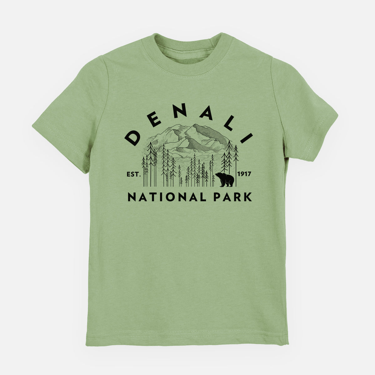 Sage green youth t-shirt laid flat, printed with a round badge of mountains, pine trees and a bear, with the words Denali National Park, Est. 1917.