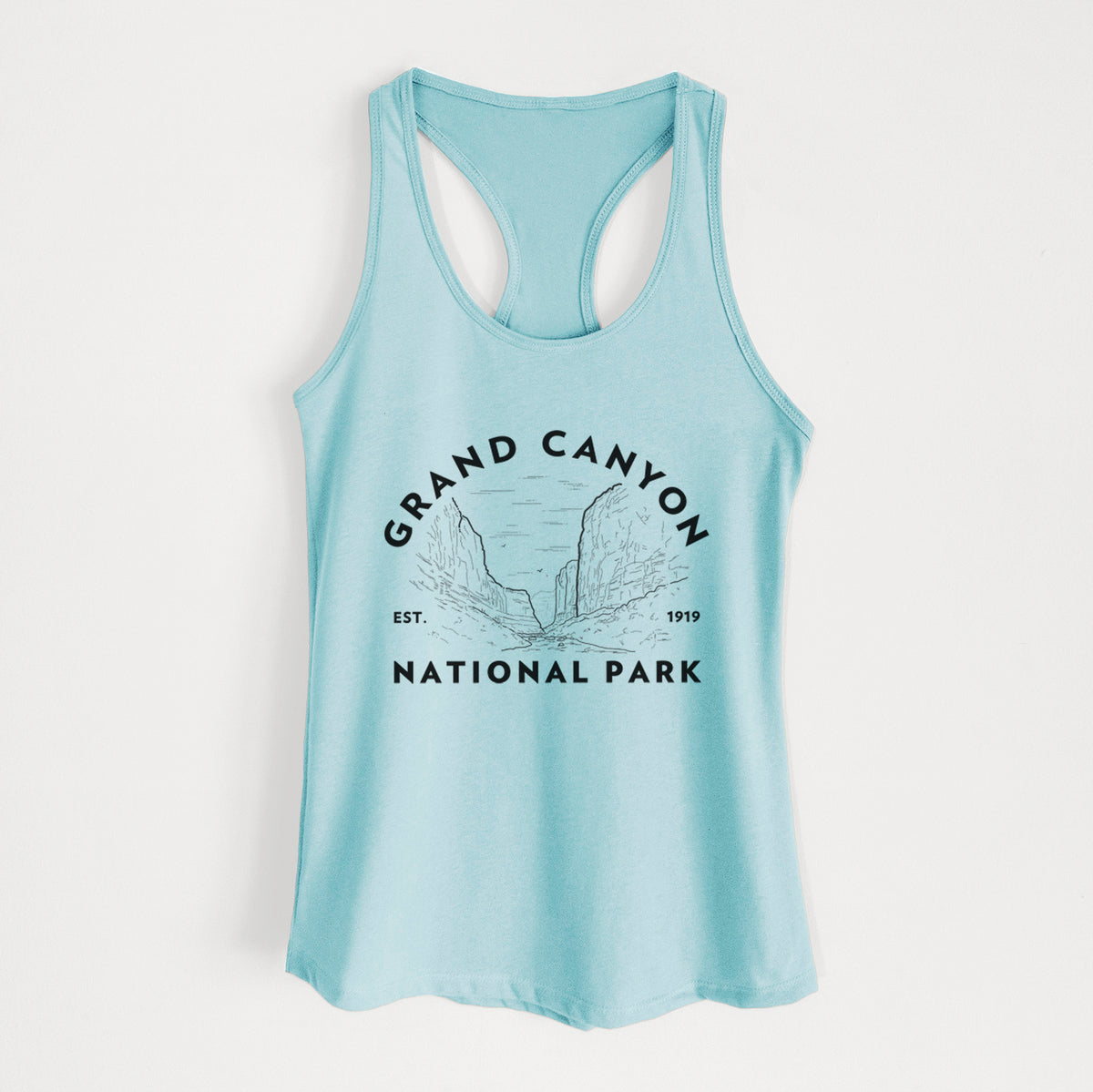 Cancun blue women's racerback tank top laid flat, printed with a round badge of canyon cliffs, with the words Grand Canyon National Park, Est. 1919.