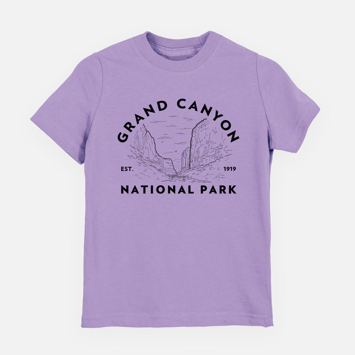 Lavender youth t-shirt laid flat, printed with a round badge of canyon cliffs, with the words Grand Canyon National Park, Est. 1919.