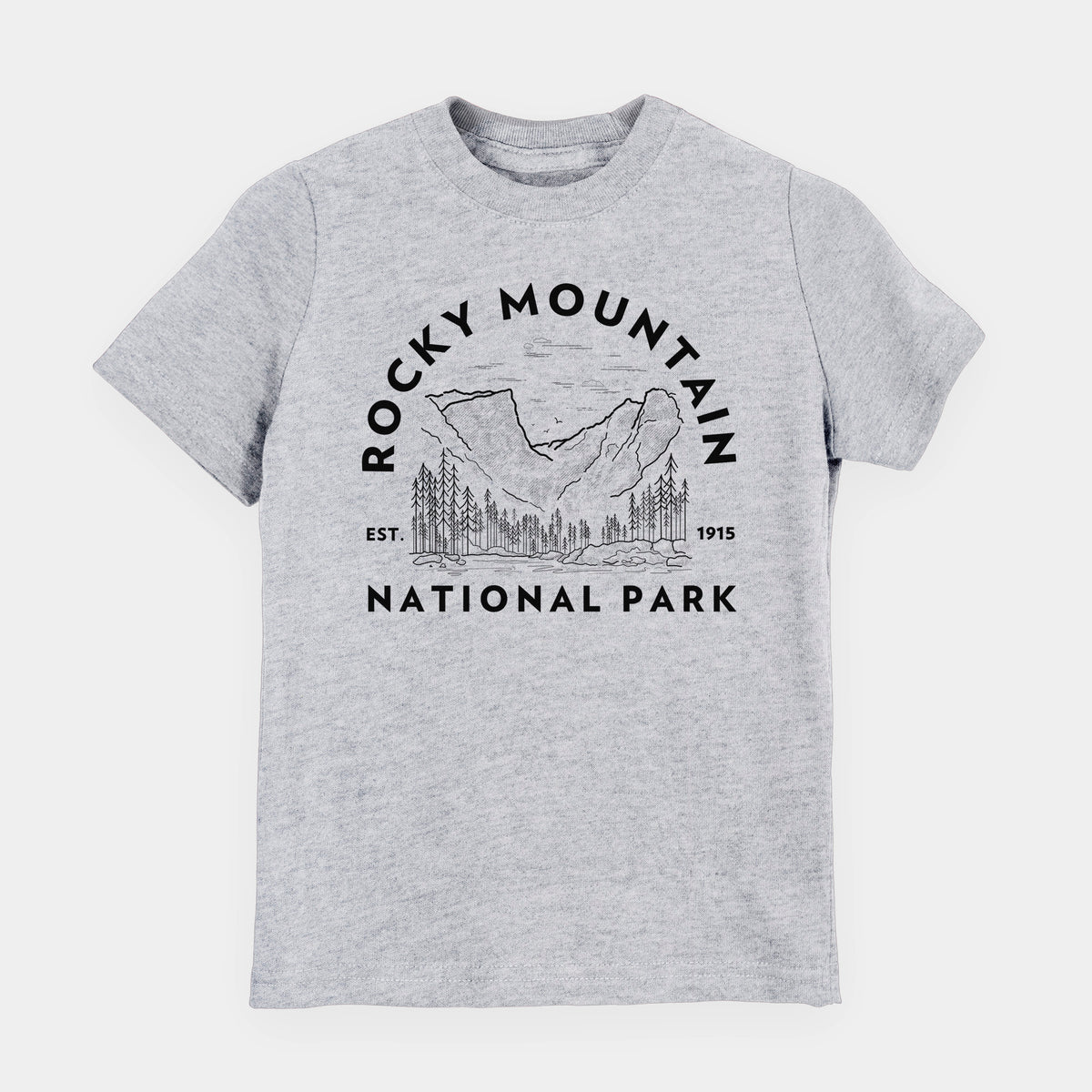 Heather grey youth t-shirt laid flat, printed with a round badge of mountains and pine trees, with the words Rocky Mountain National Park, Est. 1915.