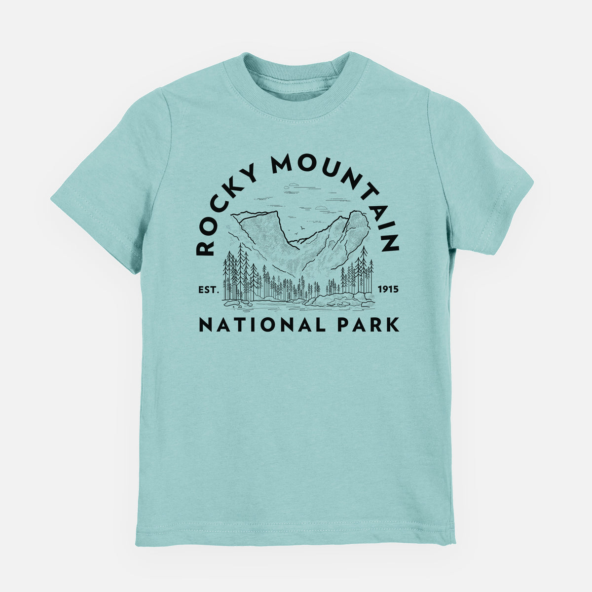 Saltwater youth t-shirt laid flat, printed with a round badge of mountains and pine trees, with the words Rocky Mountain National Park, Est. 1915.