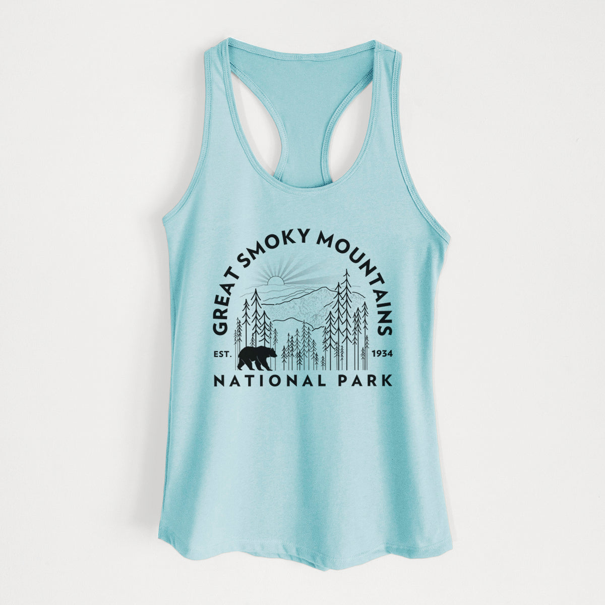 Cancun blue women's racerback tank top laid flat, printed with a round badge of mountains, pine trees and a black bear, with the words Great Smoky Mountains National Park, Est. 1934.
