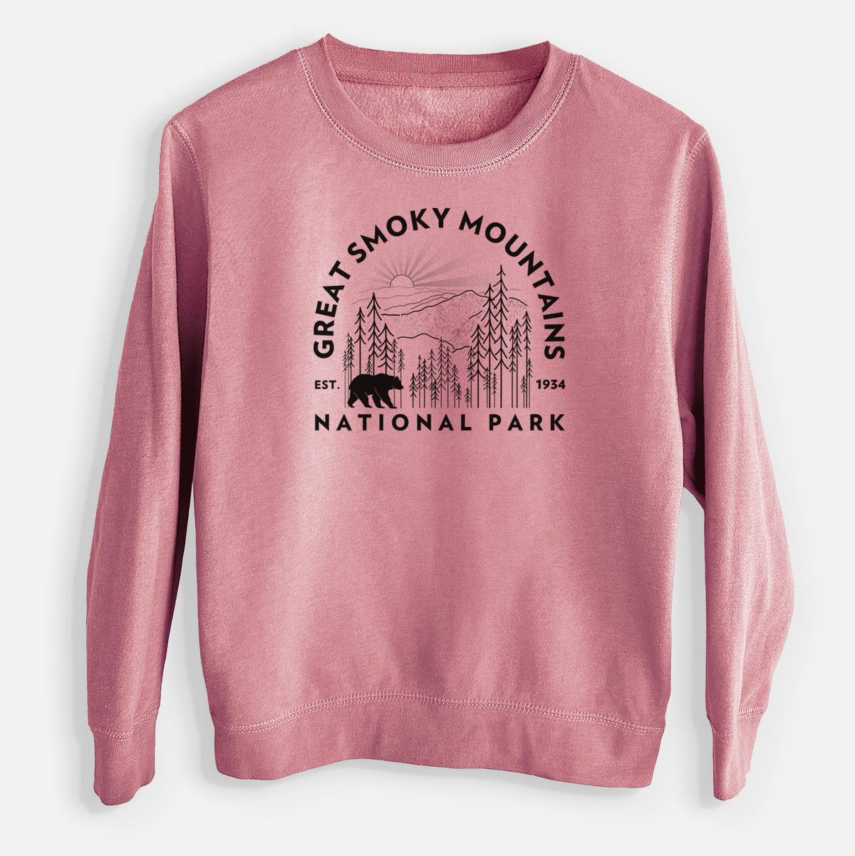 Mauve pink youth crewneck sweatshirt laid flat, printed with a round badge of mountains, pine trees and a black bear, with the words Great Smoky Mountains National Park, Est. 1934.