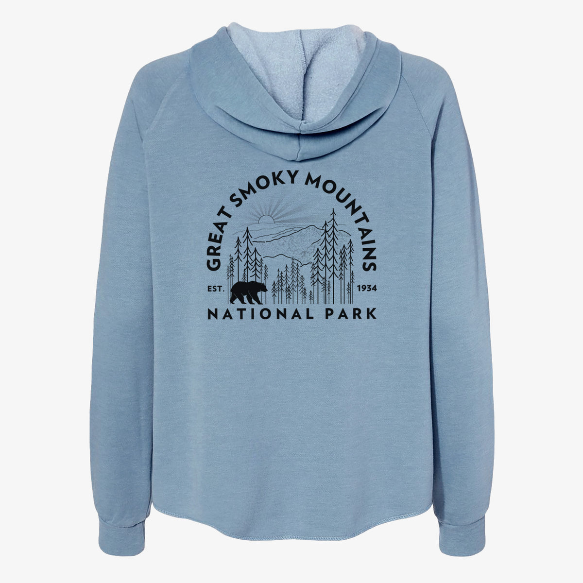Misty blue women's Cali Wave zip-up sweatshirt laid flat, printed with a round badge of mountains, pine trees and a black bear, with the words Great Smoky Mountains National Park, Est. 1934.