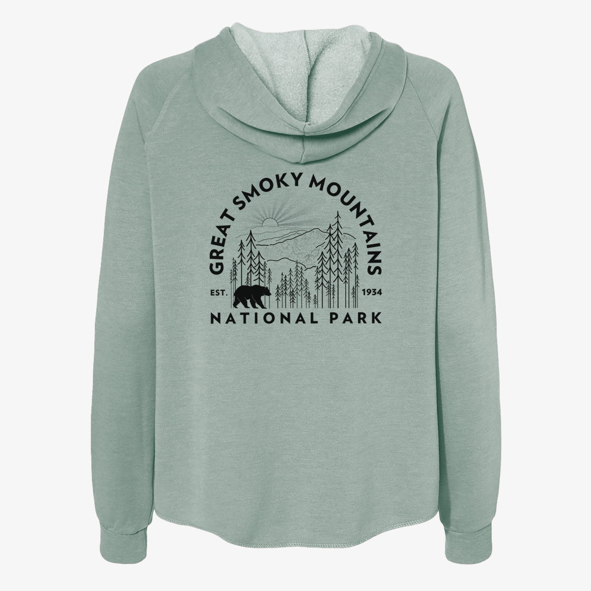 Sage green women's Cali Wave zip-up sweatshirt laid flat, printed with a round badge of mountains, pine trees and a black bear, with the words Great Smoky Mountains National Park, Est. 1934.