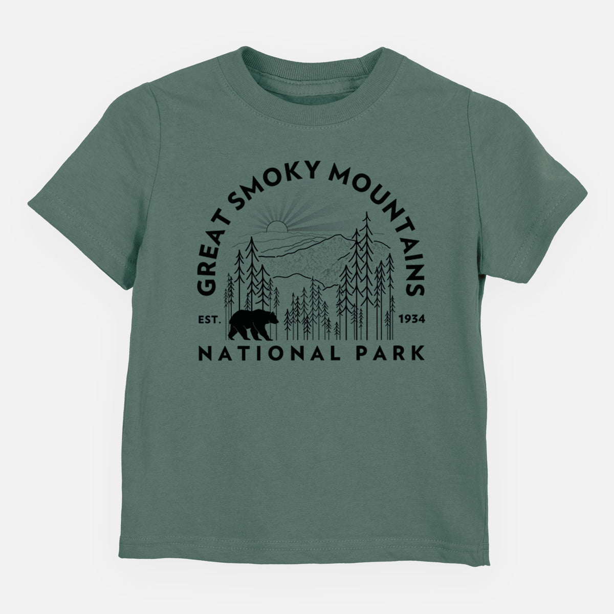 Basil green toddler t-shirt laid flat, printed with a round badge of mountains, pine trees and a black bear, with the words Great Smoky Mountains National Park, Est. 1934.