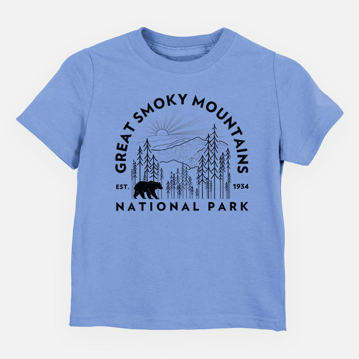 Carolina blue toddler t-shirt laid flat, printed with a round badge of mountains, pine trees and a black bear, with the words Great Smoky Mountains National Park, Est. 1934.