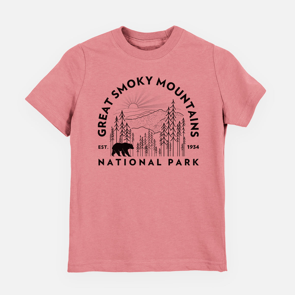 Mauve pink youth t-shirt laid flat, printed with a round badge of mountains, pine trees and a black bear, with the words Great Smoky Mountains National Park, Est. 1934.