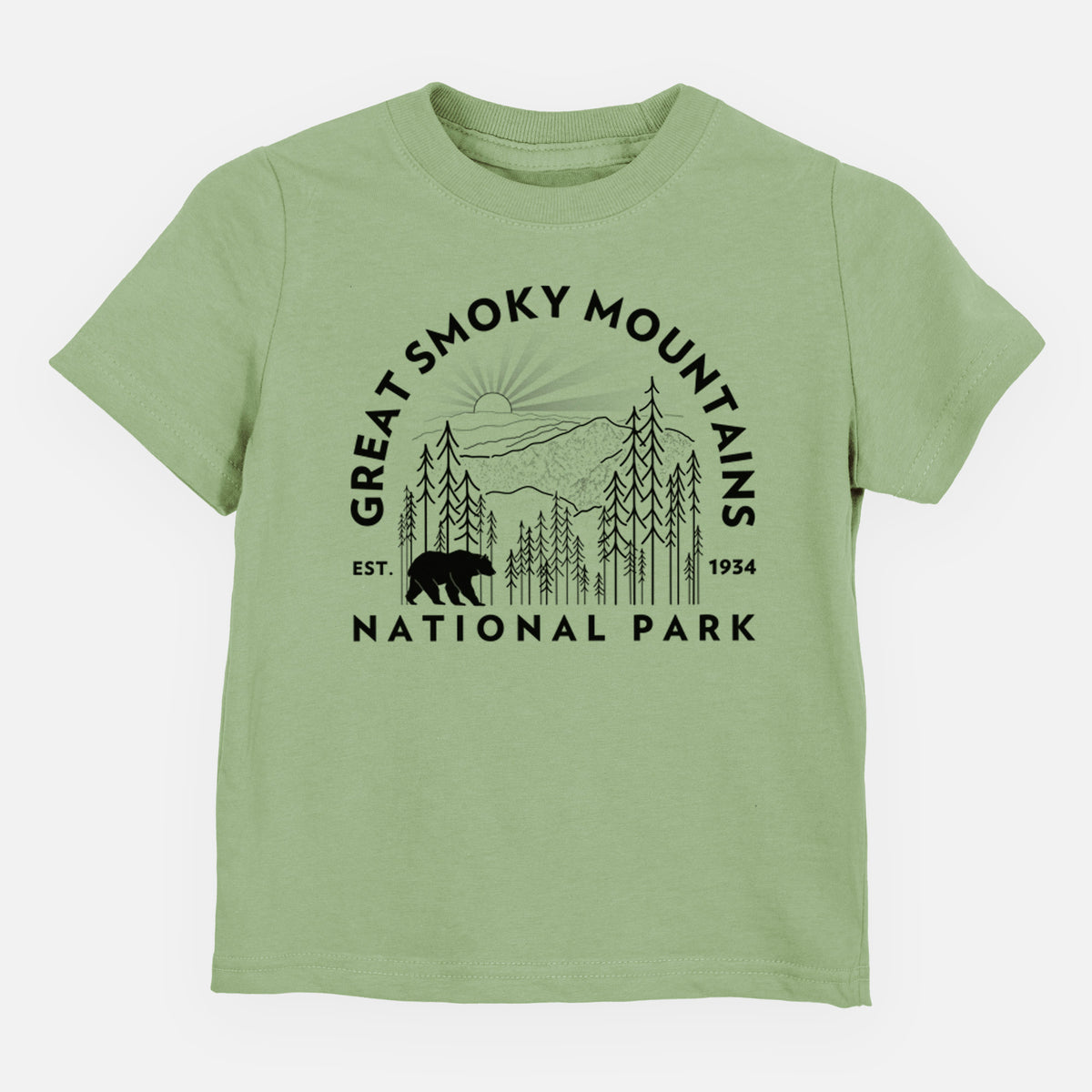 Sage green toddler t-shirt laid flat, printed with a round badge of mountains, pine trees and a black bear, with the words Great Smoky Mountains National Park, Est. 1934.